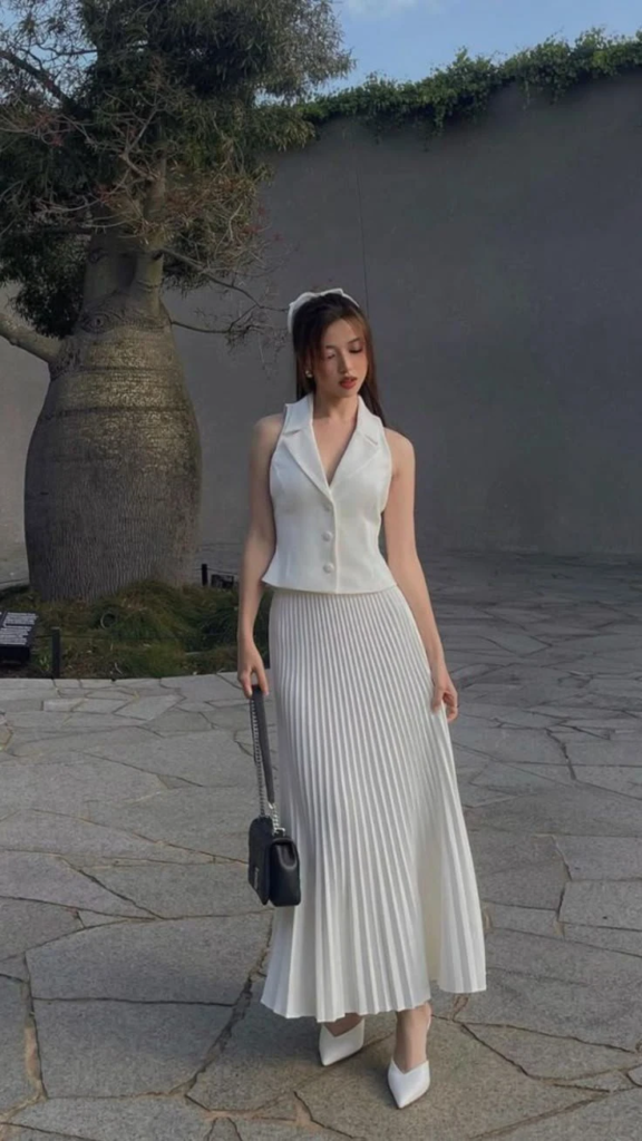 Classic White Vest with Pleated Skirt