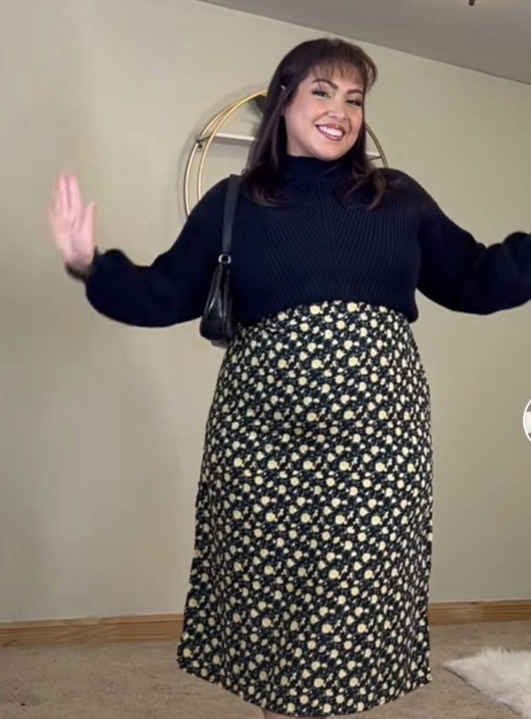 Black Turtleneck with Patterned Midi Skirt