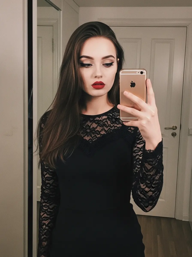 Deep Scarlet Lipstick with Heavy Eyeliner and White Foundation